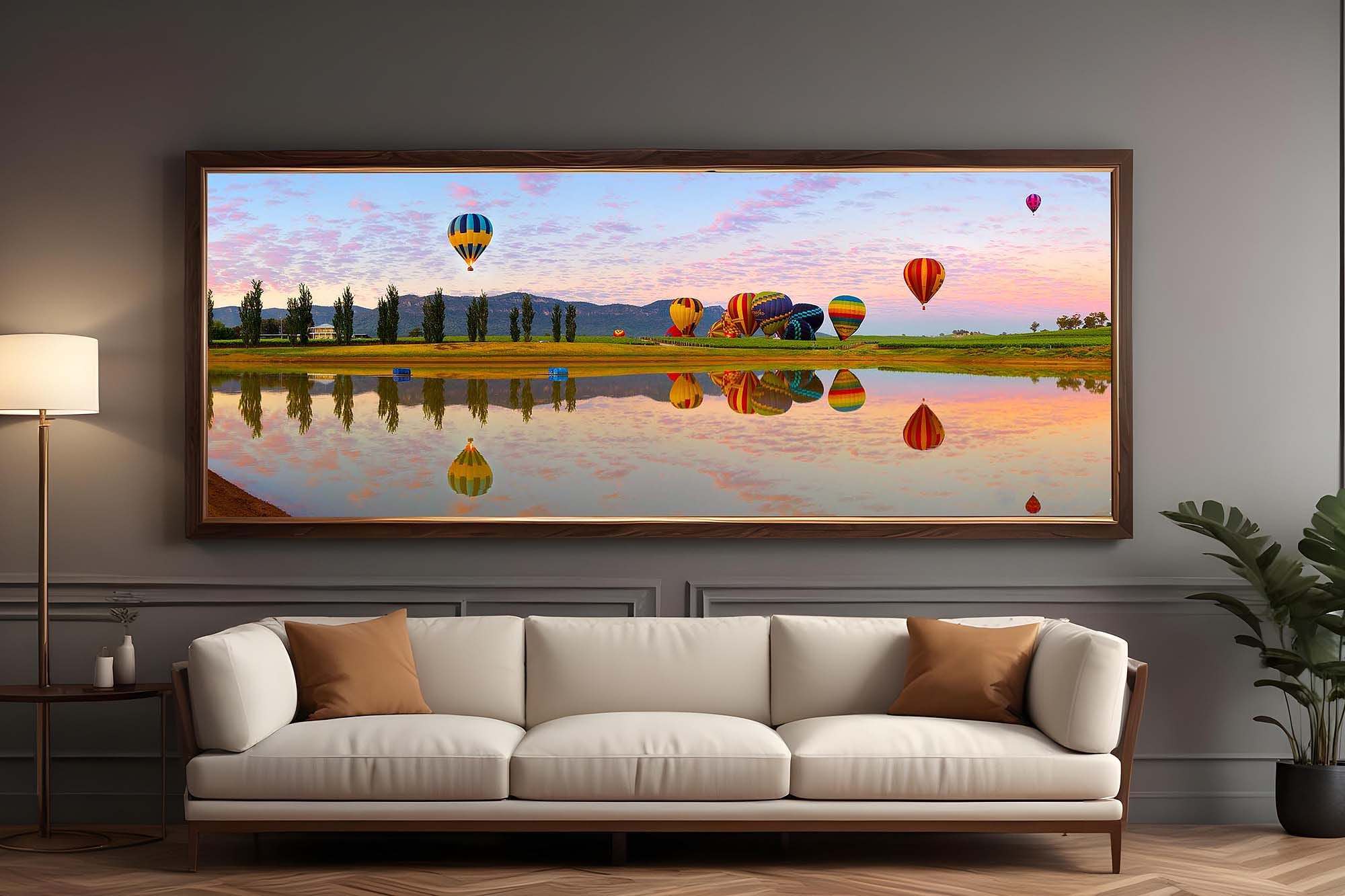 Hunter Valley landscape photography print of hot air balloons over a dam with reflections, vineyards, and rolling hills
