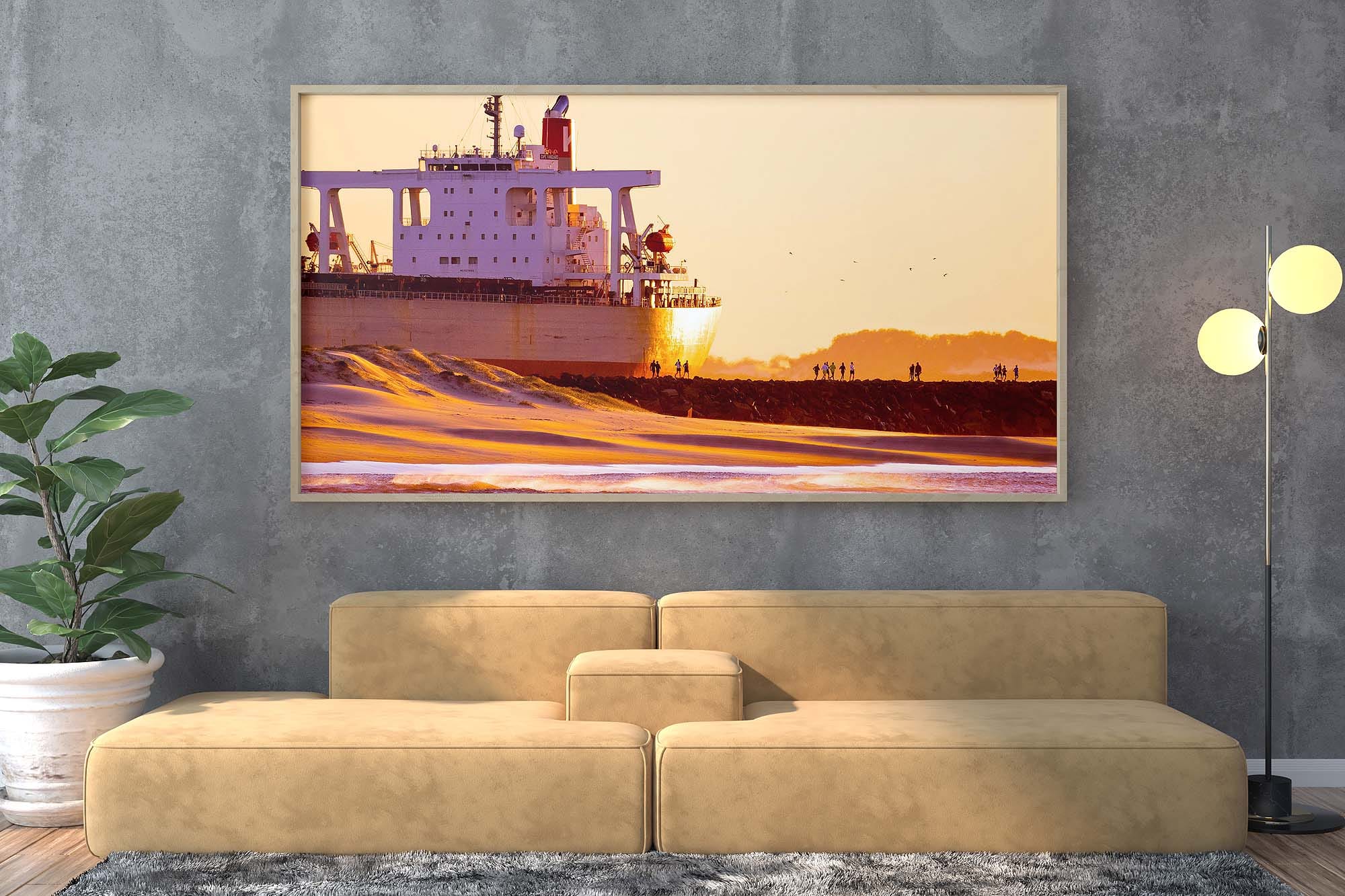 Large framed wall print of coal ship in Newcastle harbor at sunrise