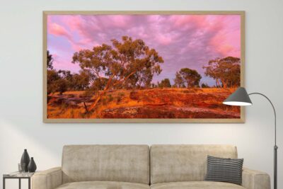 Country landscape wall art print featuring a rural sunrise scene with soft morning light over farmland and open countryside in Australia.