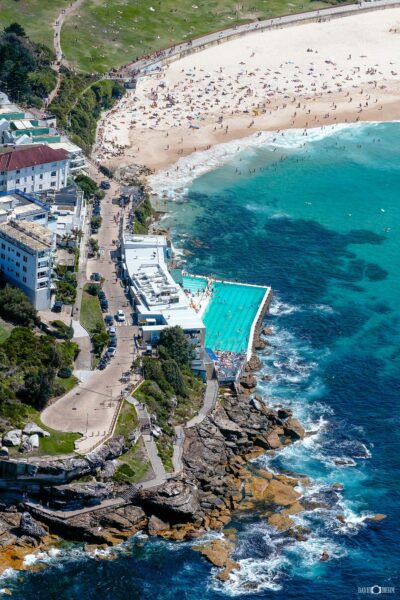 Aerial photograph of the Bondi Icebergs ocean pool and clubhouse overlooking Bondi Beach in Sydney, Australia.