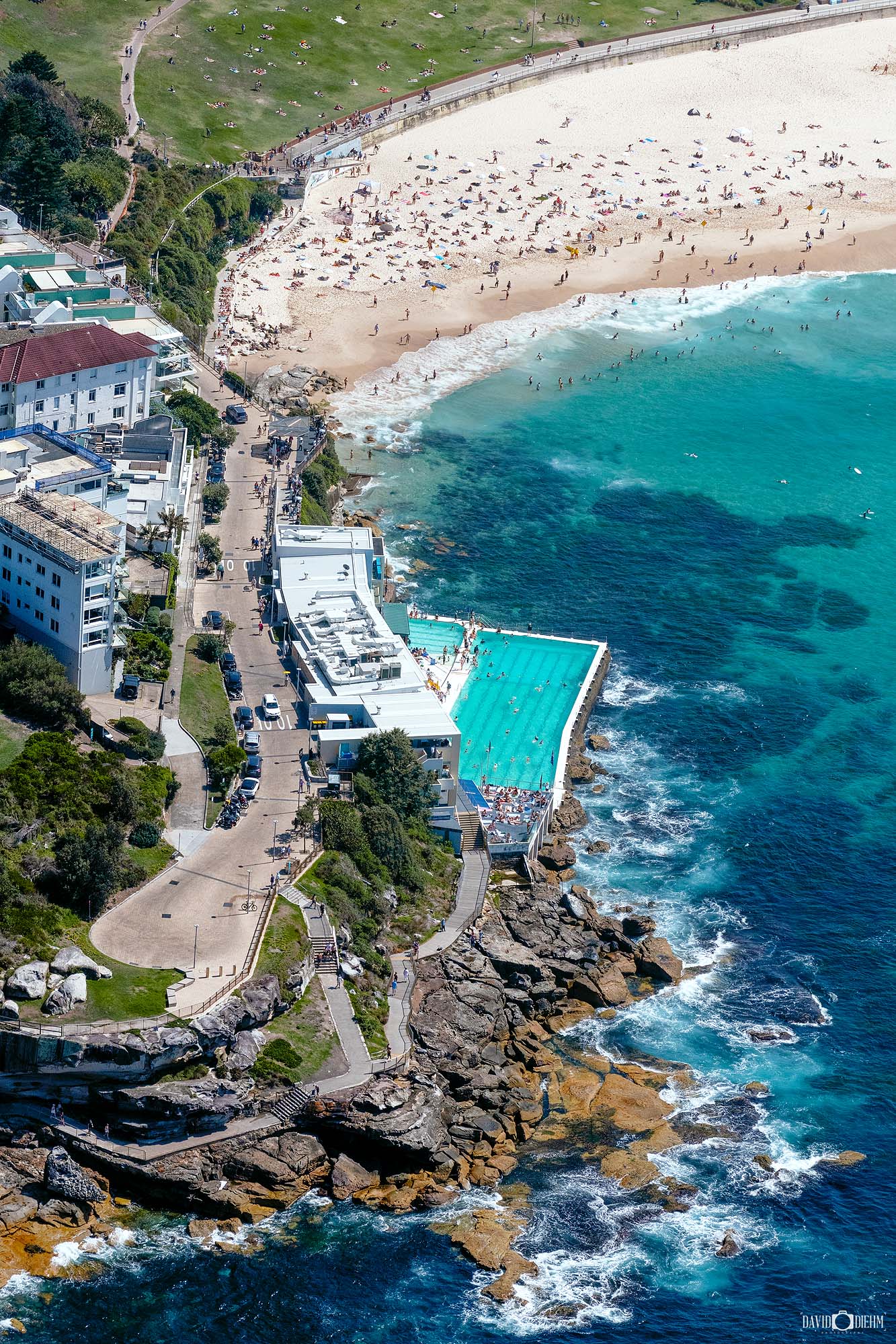 Aerial photograph of the Bondi Icebergs ocean pool and clubhouse overlooking Bondi Beach in Sydney, Australia.