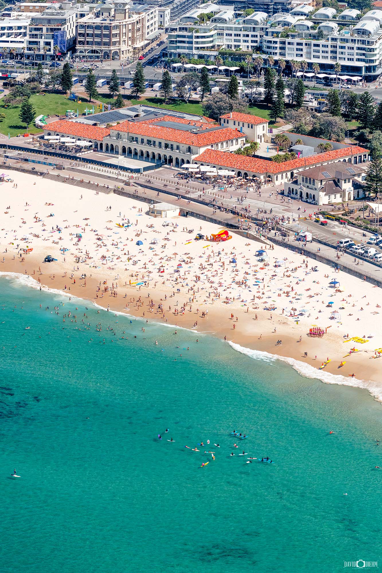 Aerial photograph of Bondi Beach in Sydney, Australia, featuring turquoise ocean and golden sand, presented as coastal wall art.