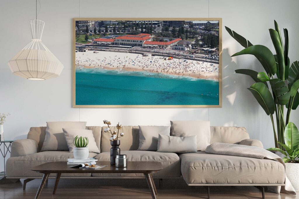 Framed aerial photograph of Bondi Beach in summer styled as modern coastal wall art.