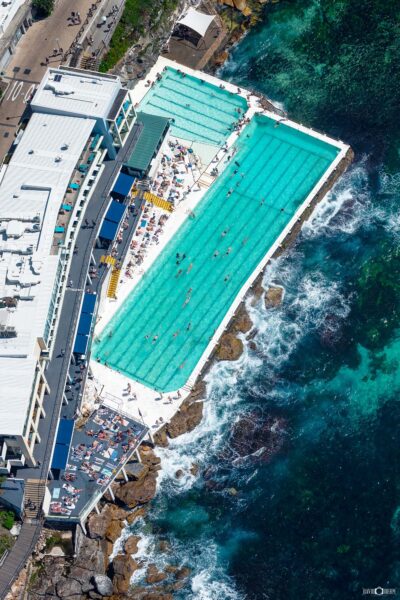 Aerial photograph of Bondi Icebergs ocean pool and clubhouse overlooking Bondi Beach in Sydney,