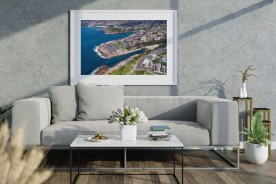 Framed aerial photograph featuring both Clovelly Beach and Coogee Beach displayed as premium coastal wall art.