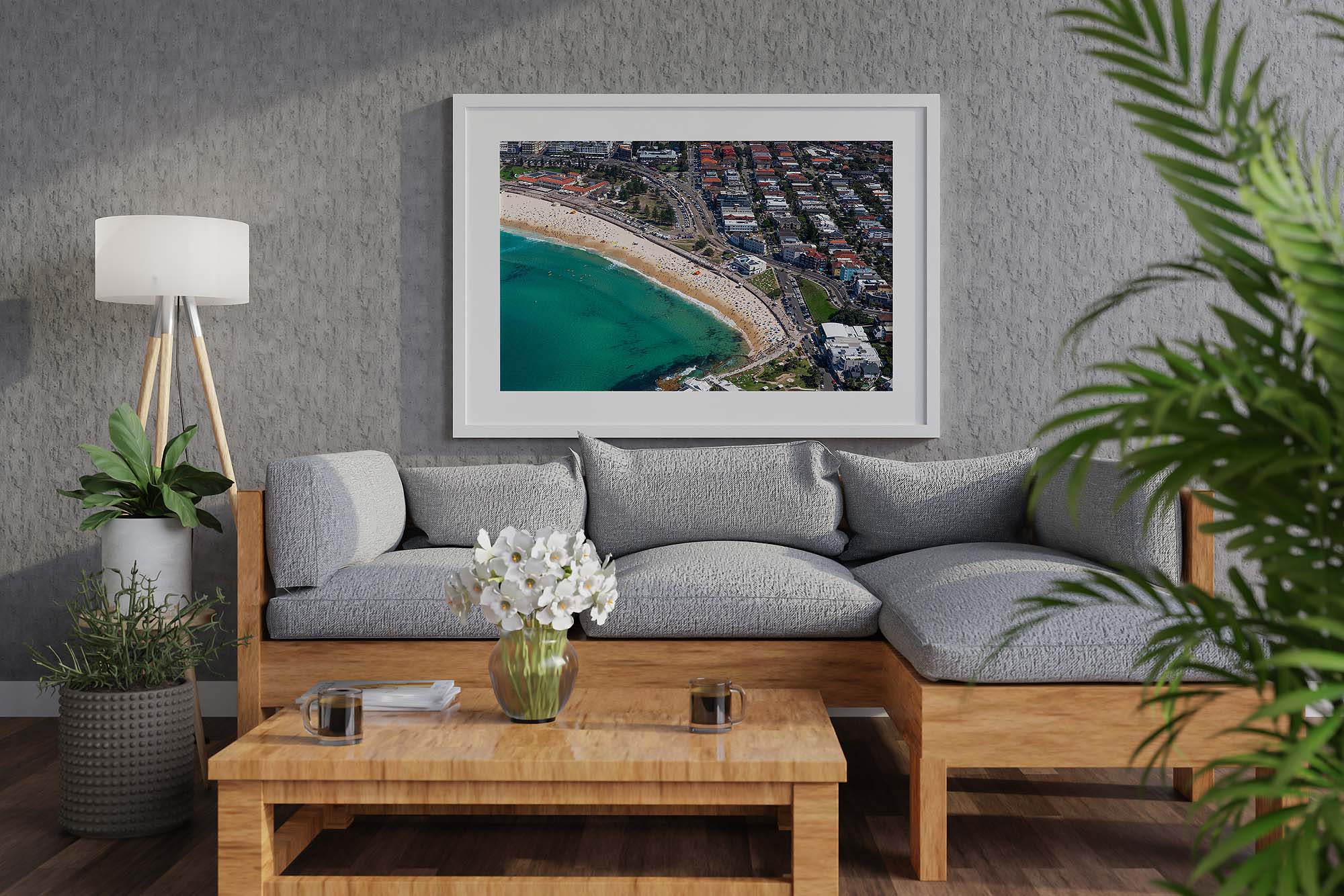 Framed aerial photograph of North Bondi Beach displayed as modern coastal wall art in a contemporary interior.