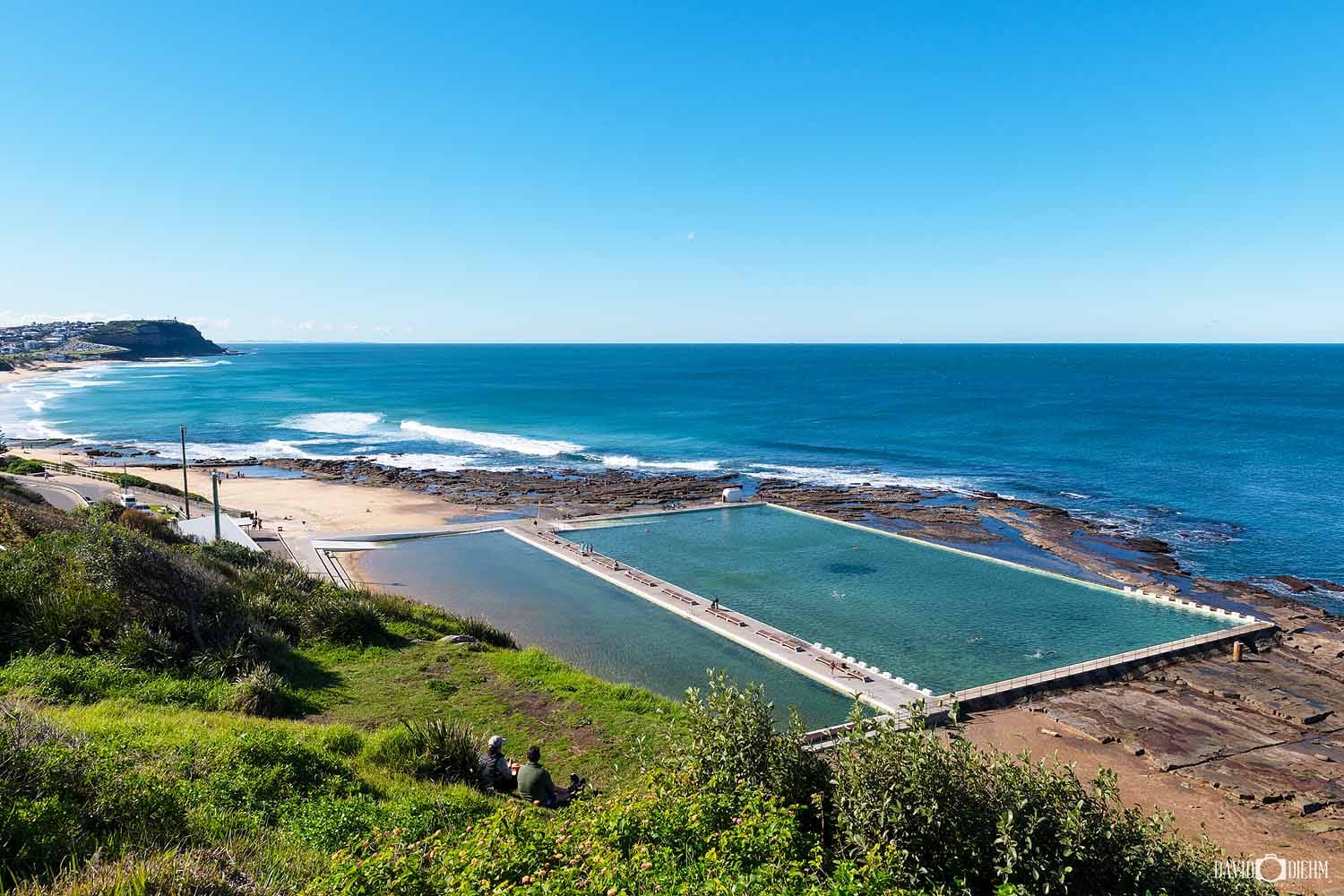 Merewether Ocean Baths viewed from Robinson Reserve overlooking the Pacific Ocean in Newcastle NSW.