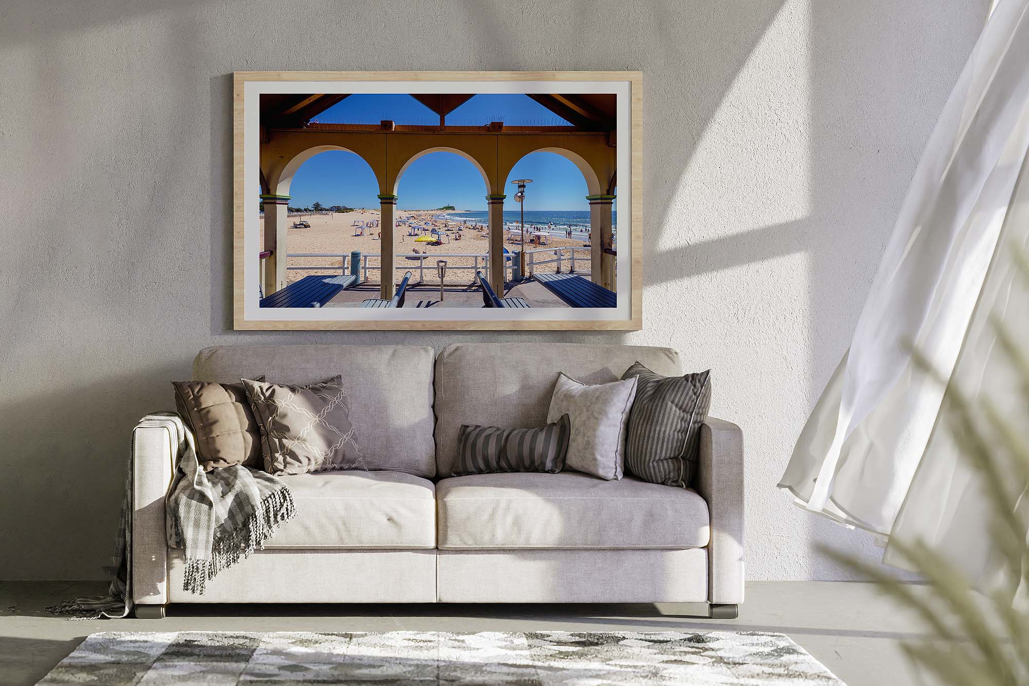 Daytime image of the Nobbys Beach pavilion arches in Newcastle capturing coastal architecture, beach access, and seaside atmosphere.