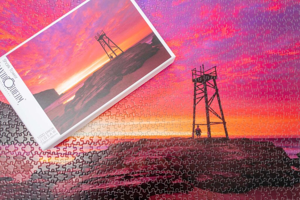 Lake Macquarie jigsaw puzzle featuring Redhead Beach at sunrise with golden morning light, ocean waves, and coastal scenery in New South Wales.