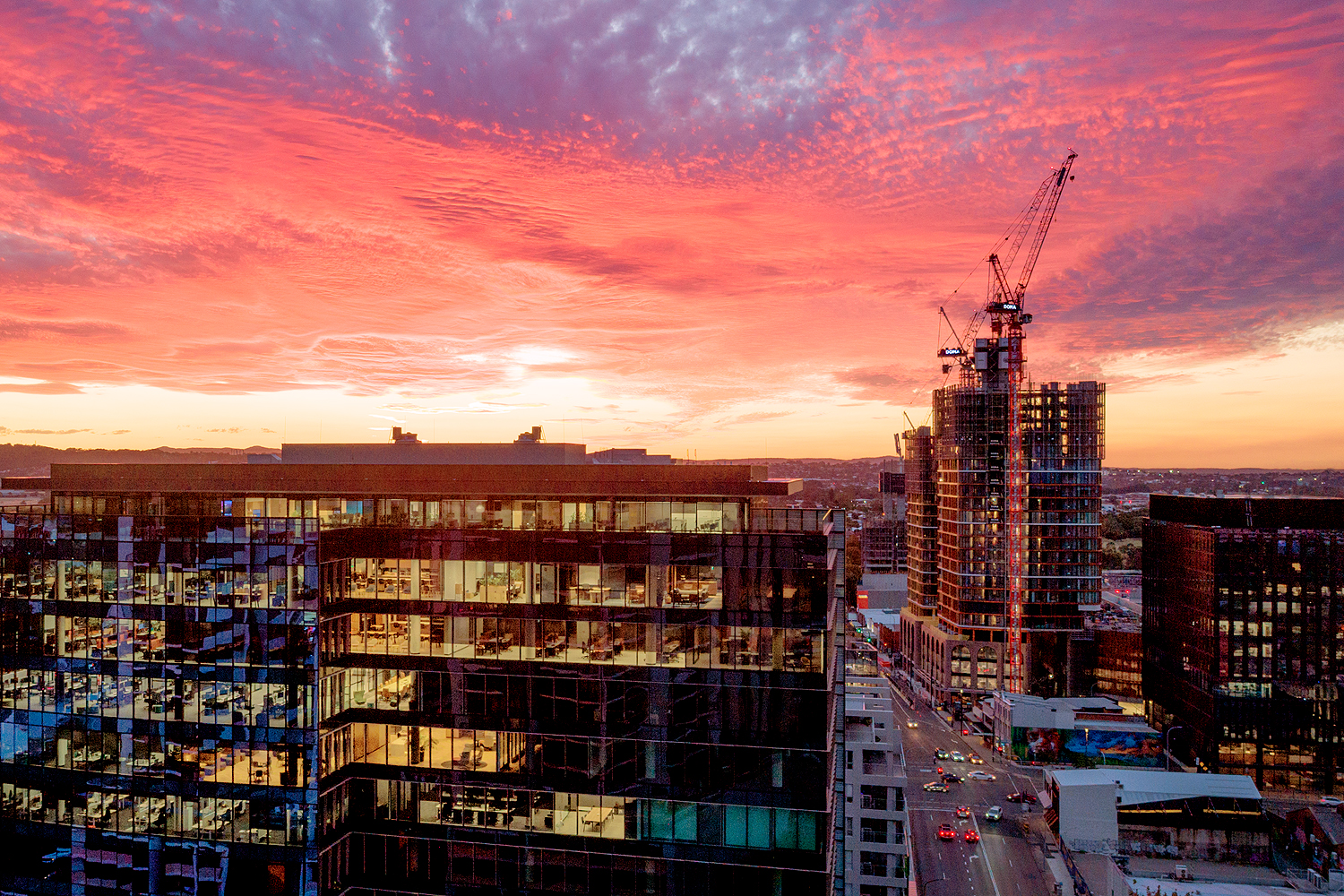 Commercial Photography Newcastle aerial sunset view over Newcastle CBD showcasing city development and infrastructure.