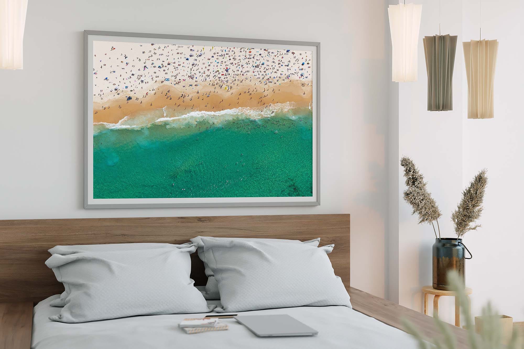 how-to-choose-wall-art-for-every-room-bedroom-bondi-beach-aerial.jpg Bedroom styled with Bondi Beach aerial landscape print showing how to choose wall art for every room