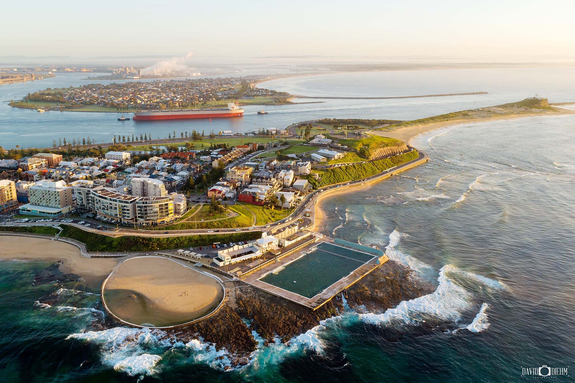 Aerial view of Newcastle Ocean Baths, Newcastle Beach and the Newcastle city coastline in NSW Australia