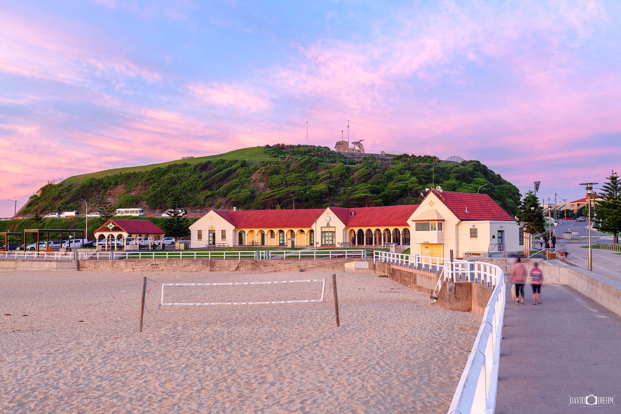 Nobbys Beach Pavilion at sunset with Nobbys Headland in Newcastle NSW Australia