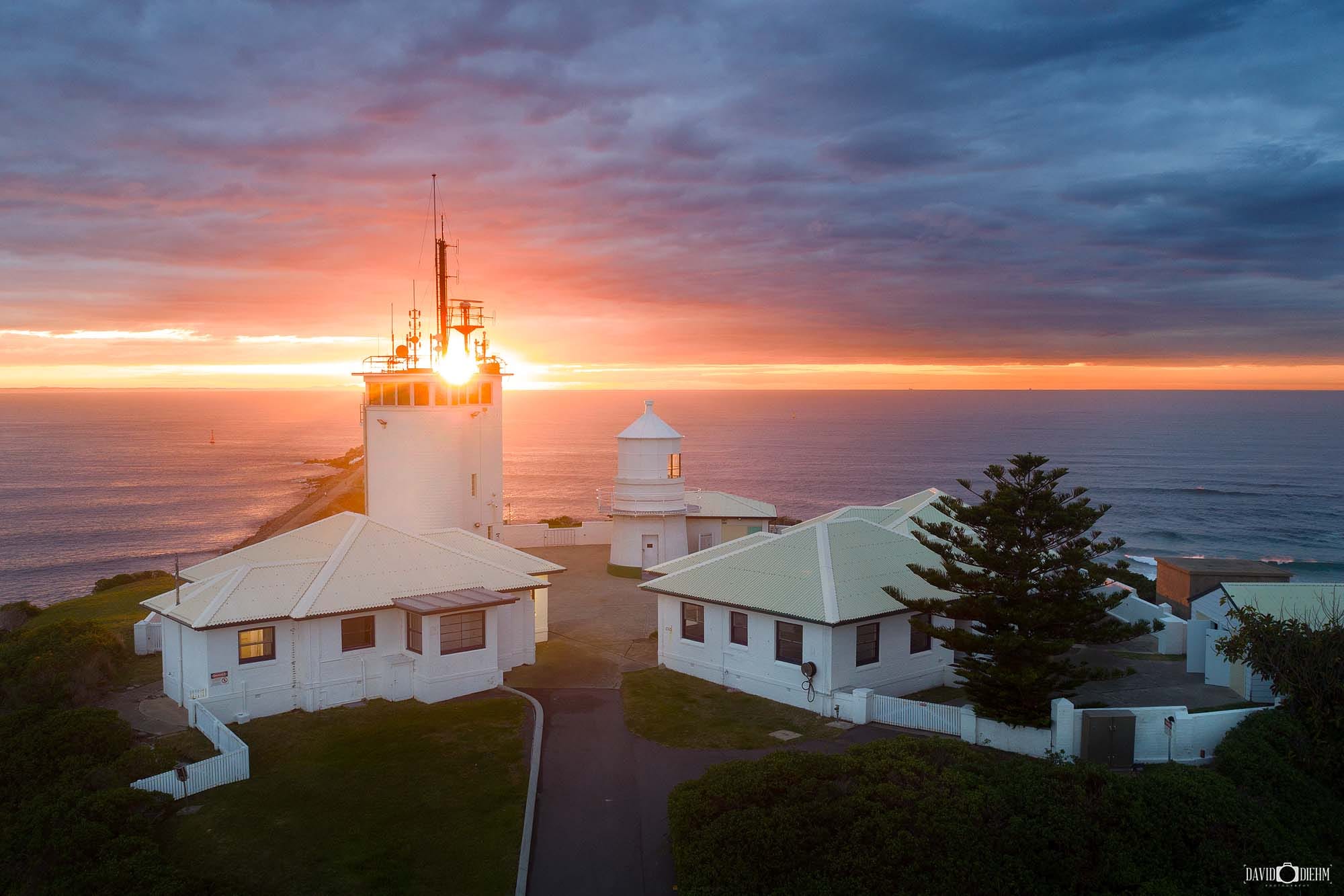 Sunrise over Nobbys Lighthouse overlooking Newcastle Harbour and the Pacific Ocean in Newcastle NSW