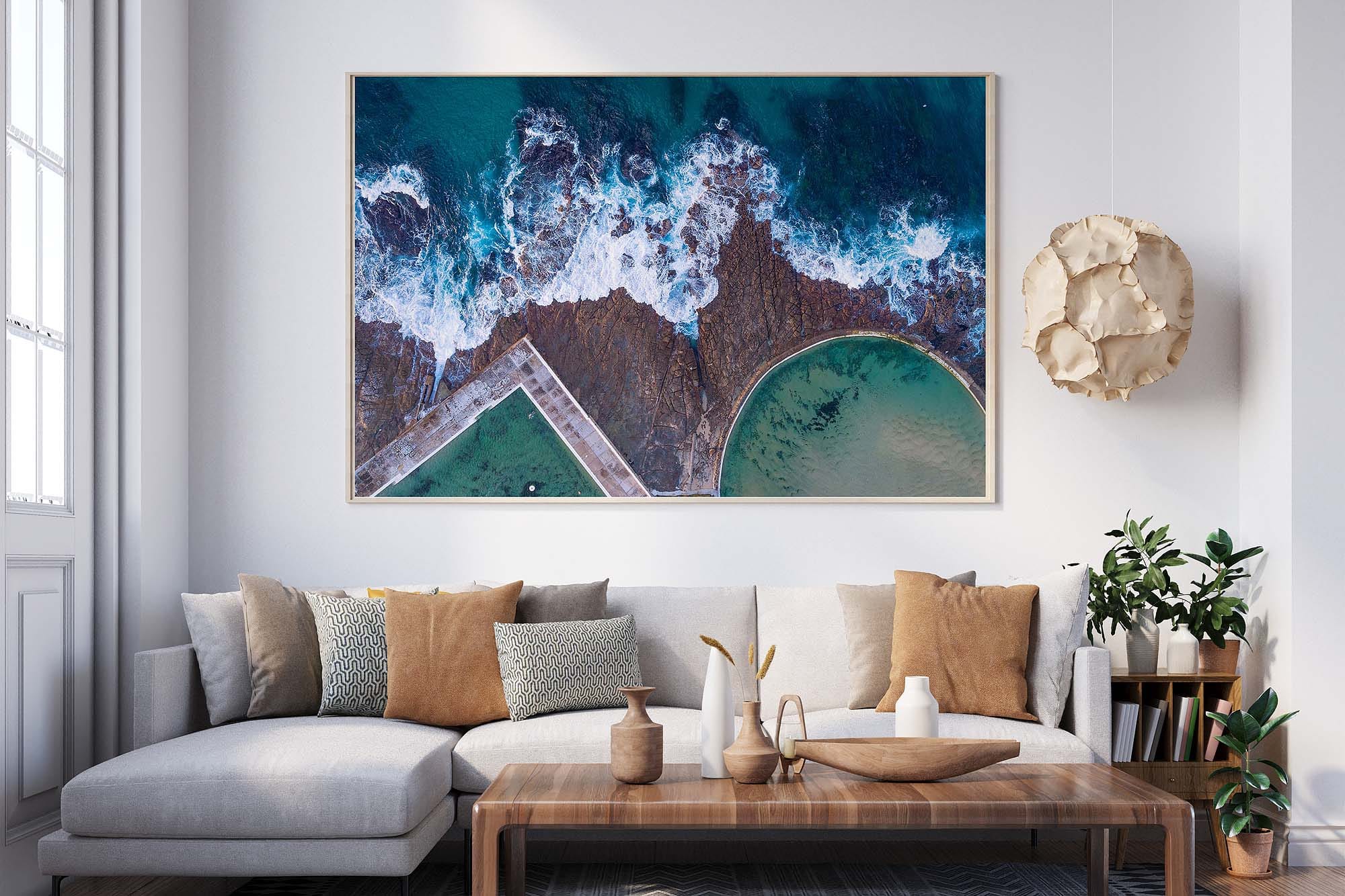 newcastle-landscape-photography-print-aerial-newcastle-ocean-baths-sunrise.jpg Aerial Newcastle landscape photography print featuring Newcastle Ocean Baths, coastal rock platform, and sunrise light over the Newcastle coastline