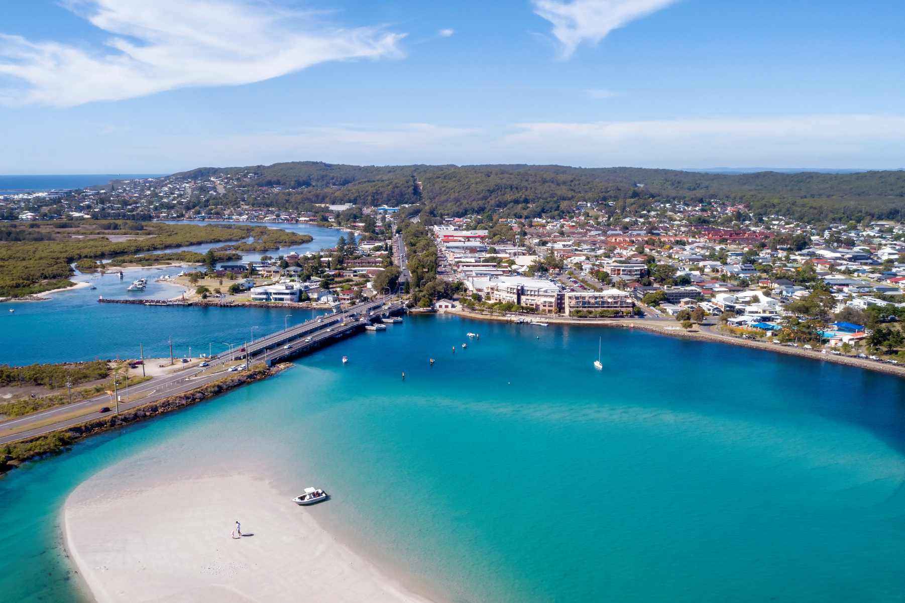 Aerial view of Swansea Bridge and Swansea Channel with turquoise water in Lake Macquarie NSW