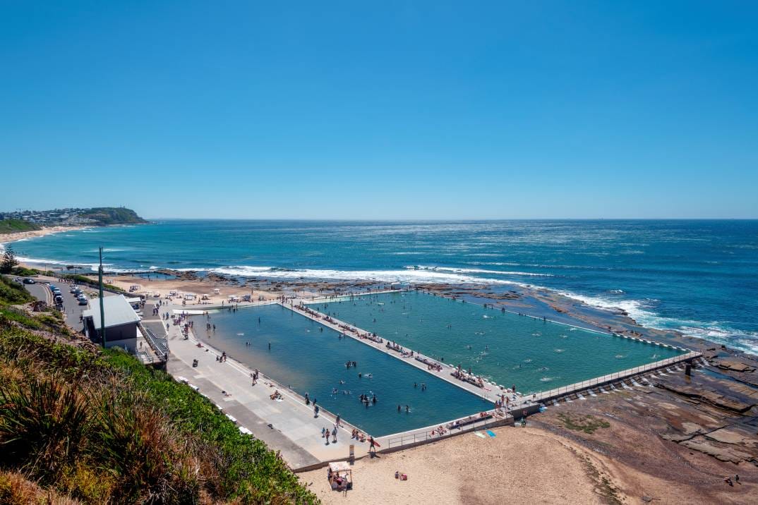 Aerial view of Merewether Ocean Baths, Robinson Reserve and Merewether Beach in Newcastle NSW.
