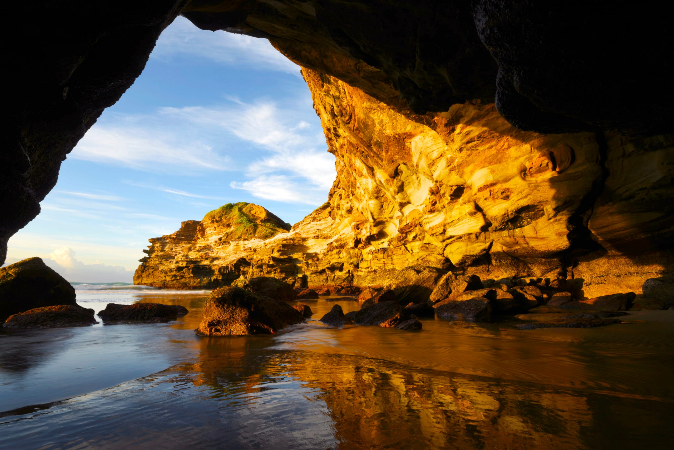 Sea cave at Ghosties Beach accessible at low tide near Catherine Hill Bay Lake Macquarie
