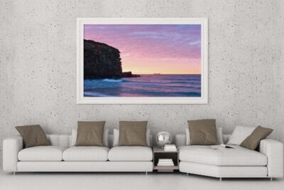 Eagle's Watch wall art featuring the eagle-shaped cliff formation overlooking the coastline at Redhead Beach NSW.