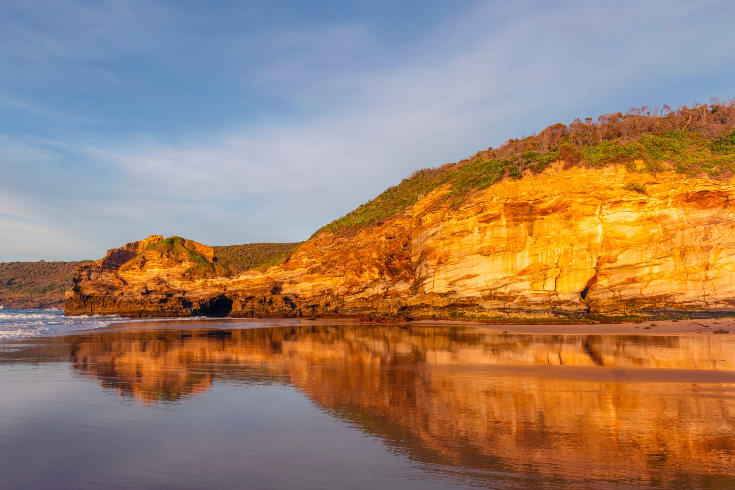 Ghosties Beach sandstone cliffs and secluded coastline south of Catherine Hill Bay in Lake Macquarie