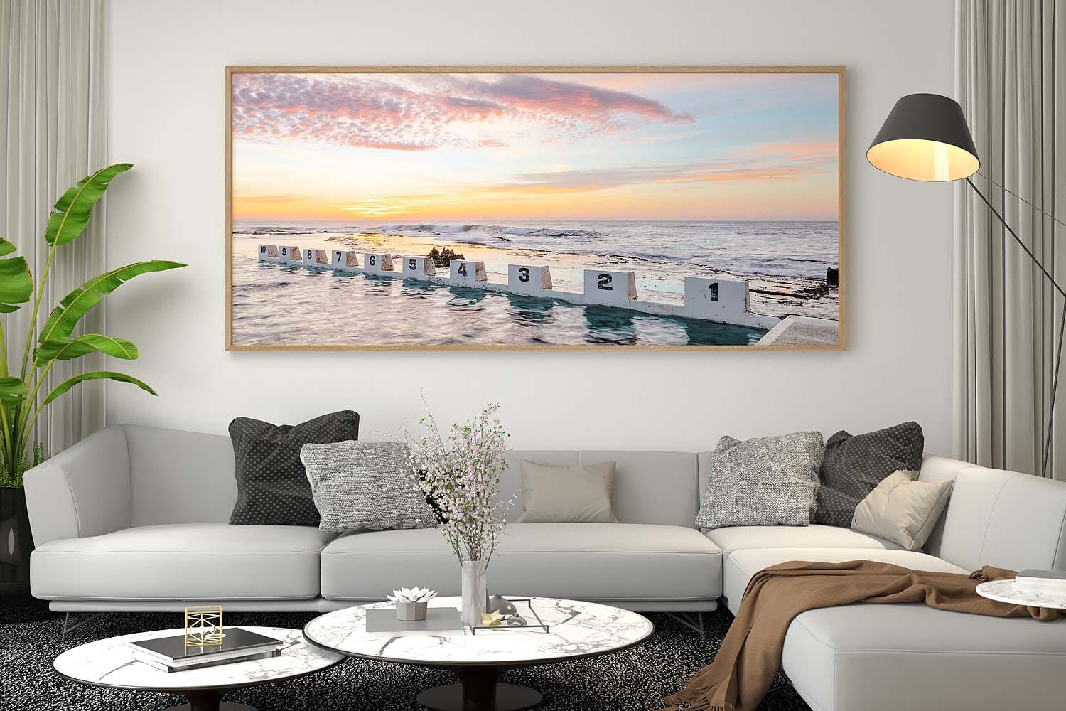 Pillars of Light wall art featuring the iconic Merewether Ocean Baths blocks illuminated by sunrise in Newcastle NSW