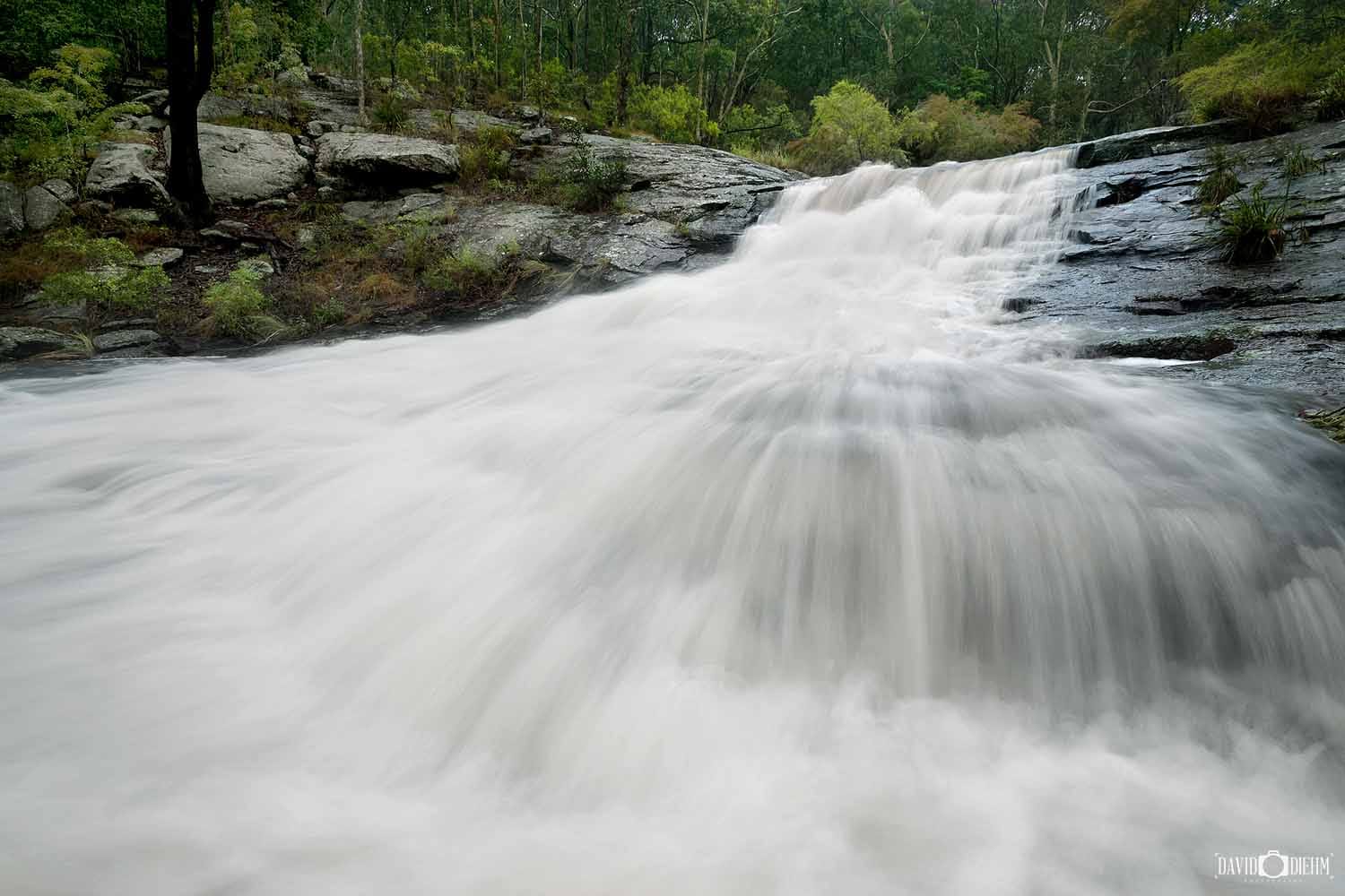 Waterfall flowing through Flaggy Creek on the Glenrock Walking Track (Yuelarbah Walking Track), Newcastle NSW.