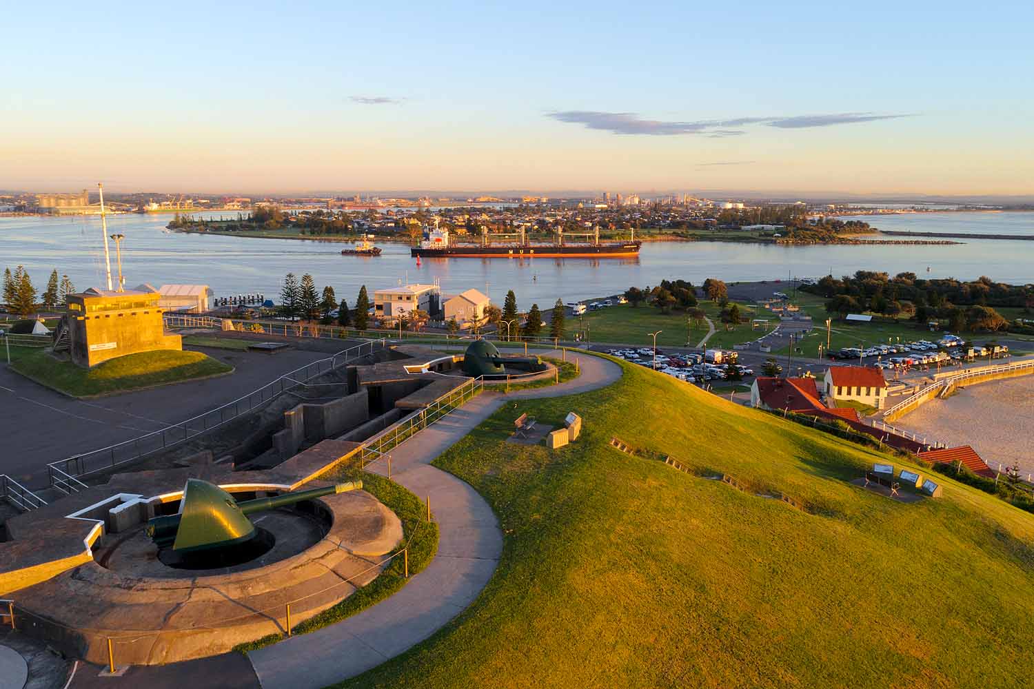Sunrise over Fort Scratchley overlooking Newcastle Harbour, Stockton and the harbour entrance in Newcastle NSW.