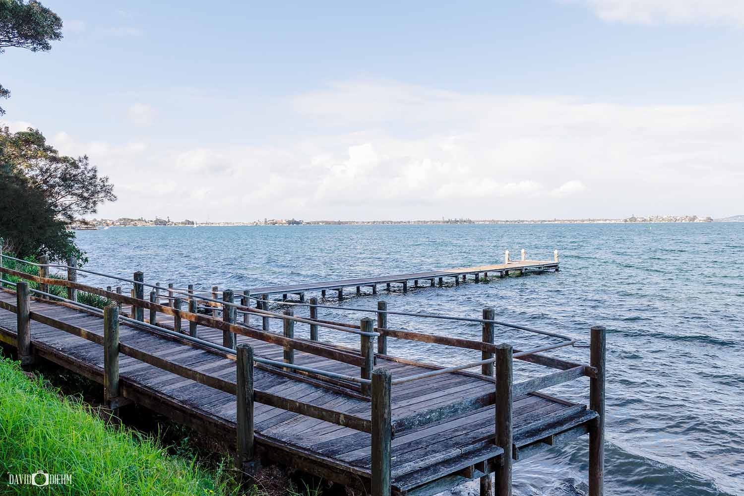 Lakeside jetty and boardwalk at Green Point Reserve on Lake Macquarie.