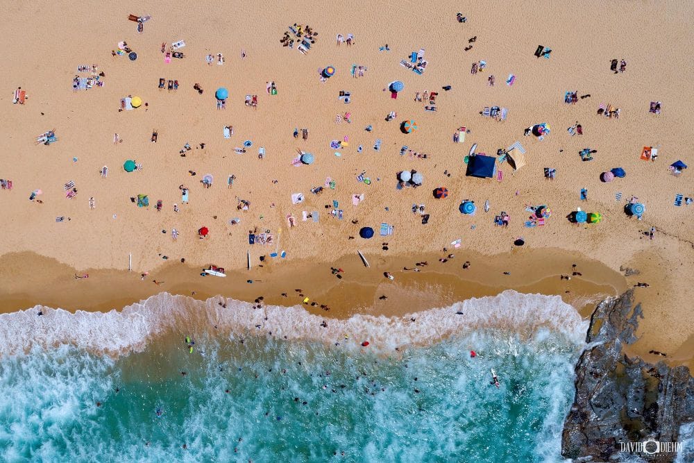 newcastle-beach-aerial-top-down-newcastle.jpg Aerial view of Newcastle Beach showing beachgoers, surf and golden sand in Newcastle NSW.