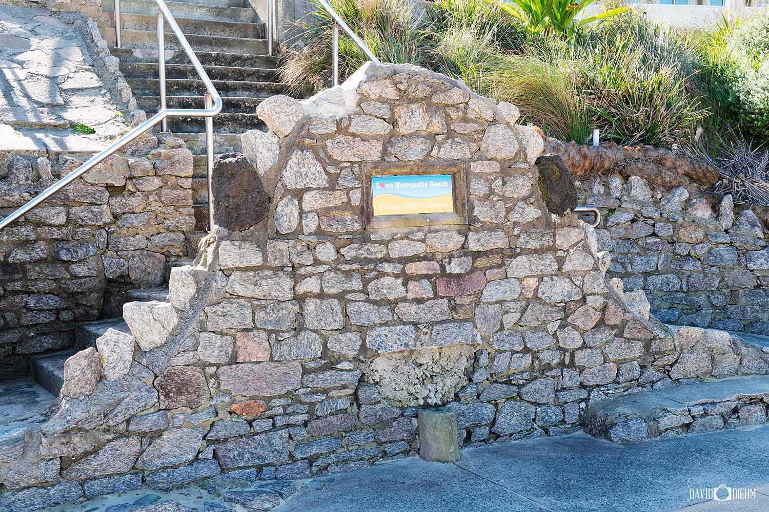 Historic ballast rocks interpretive display at Newcastle Beach on the Newcastle Coastal Geotrail, NSW.