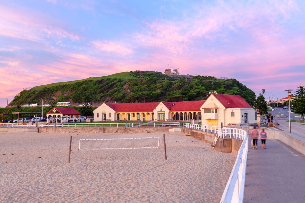 nobbys-beach-pavilion-fort-scratchley-newcastle.jpg Nobbys Beach Pavilion with Fort Scratchley overlooking Nobbys Beach in Newcastle NSW at sunset.