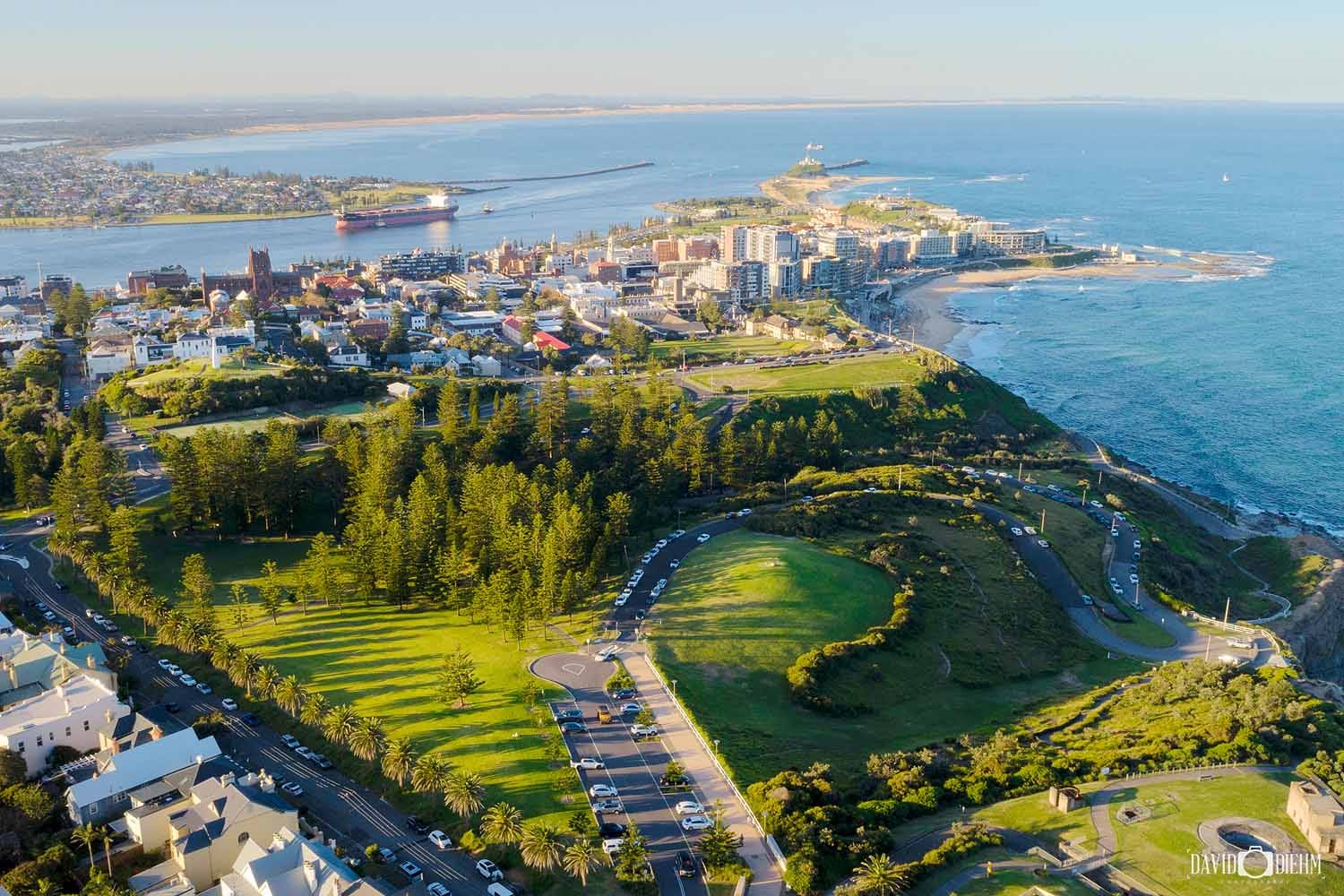 Aerial view of King Edward Park overlooking Newcastle Harbour, Nobbys Headland and Newcastle Beach.