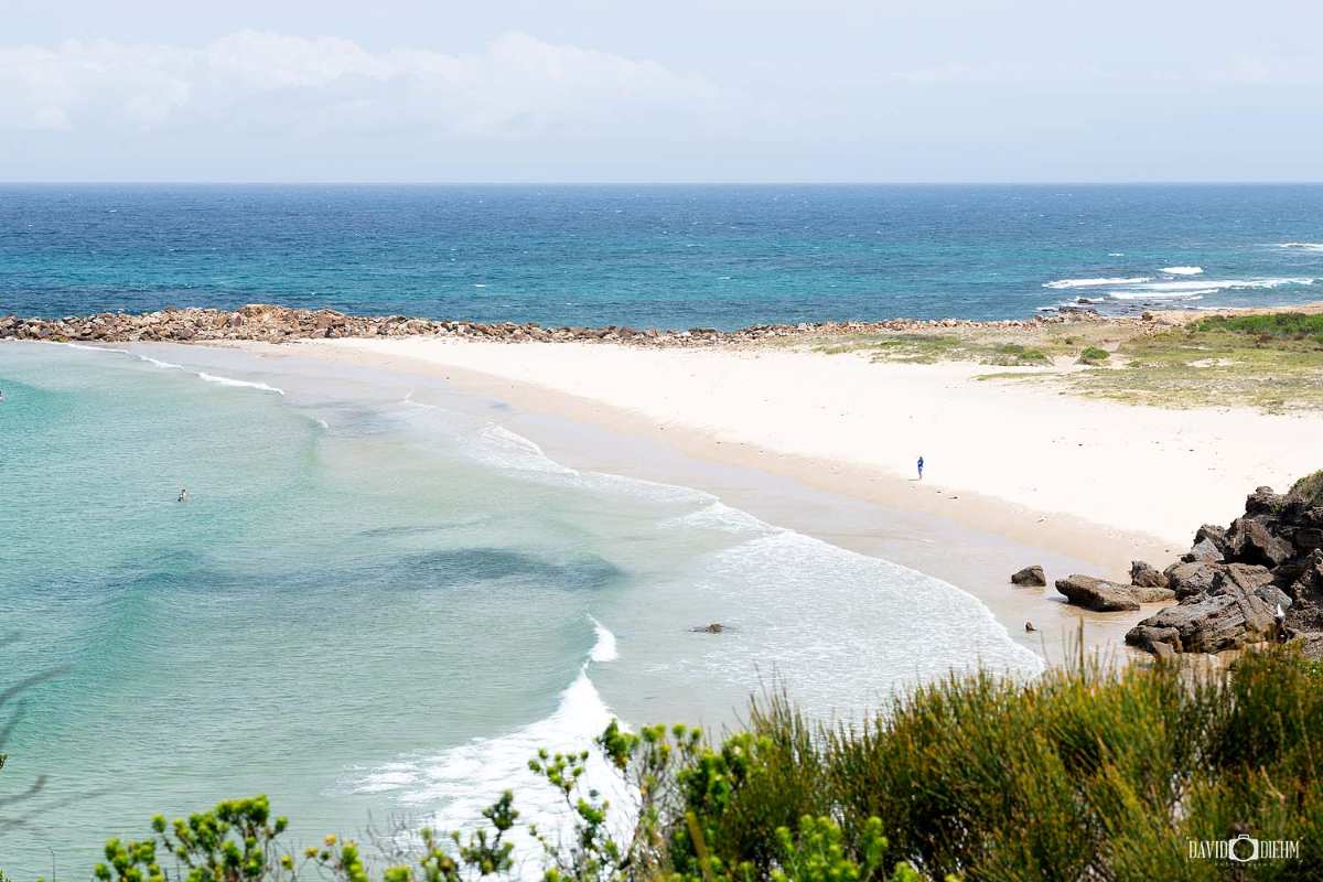 Spoon Rocks Beach sheltered bay with calm turquoise water near Lake Macquarie
