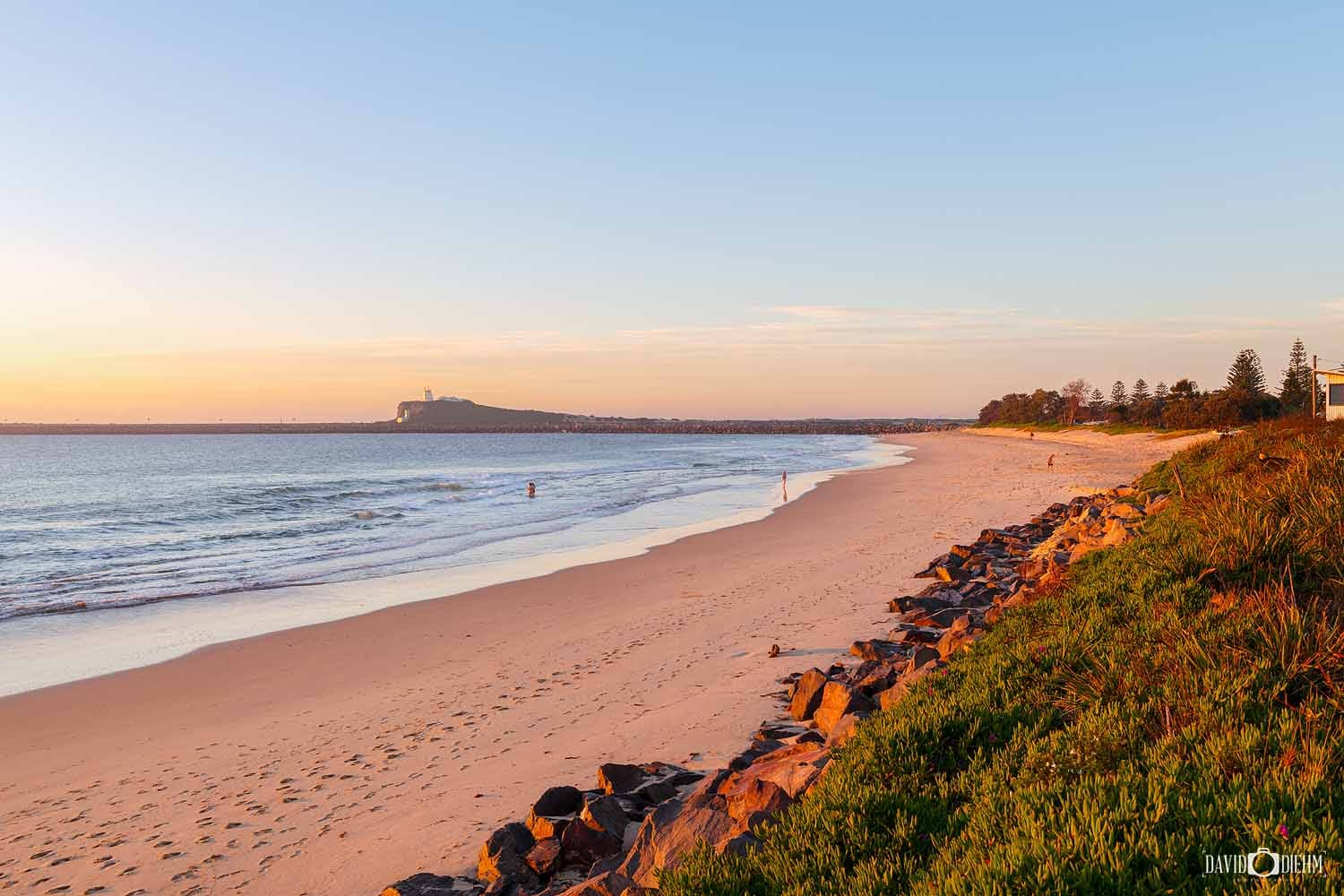 stockton-beach-looking-towards-nobbys-head-newcastle.jpg Golden sunrise over Stockton Beach looking south towards Nobbys Head Lighthouse and Newcastle Harbour.