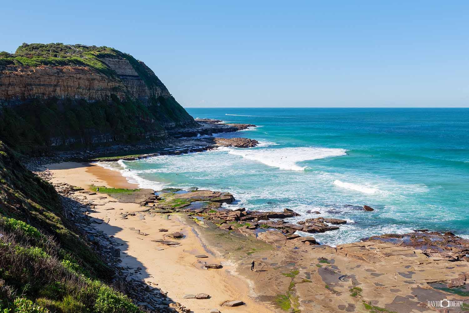susan-gilmore-beach-newcastle-nsw.jpg View of Susan Gilmore Beach beneath King Edward Park cliffs in Newcastle NSW.