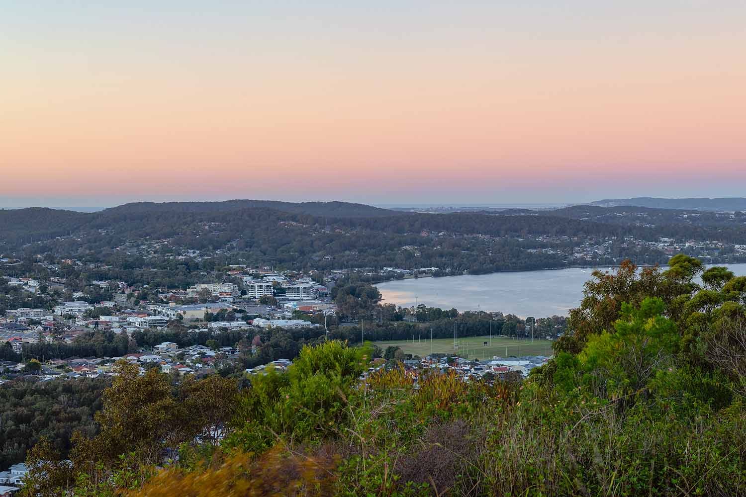 munibung-hill-lookout-sunset-warners-bay.jpg Sunset colours over Warners Bay and Lake Macquarie viewed from Munibung Hill Lookout.