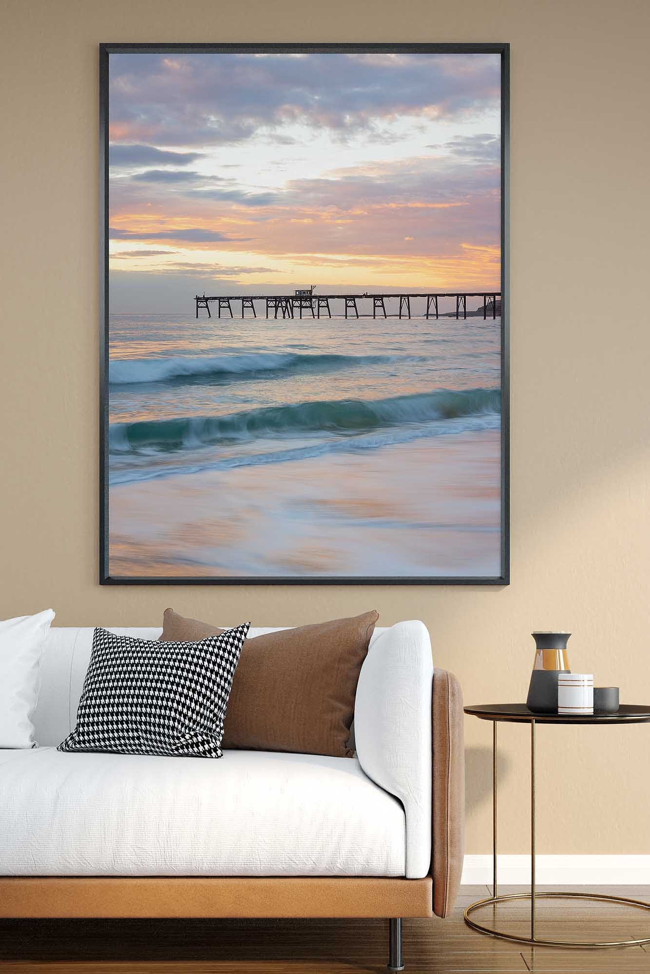 Catherine Hill Bay photography print featuring the historic jetty and ocean at sunrise displayed as wall art