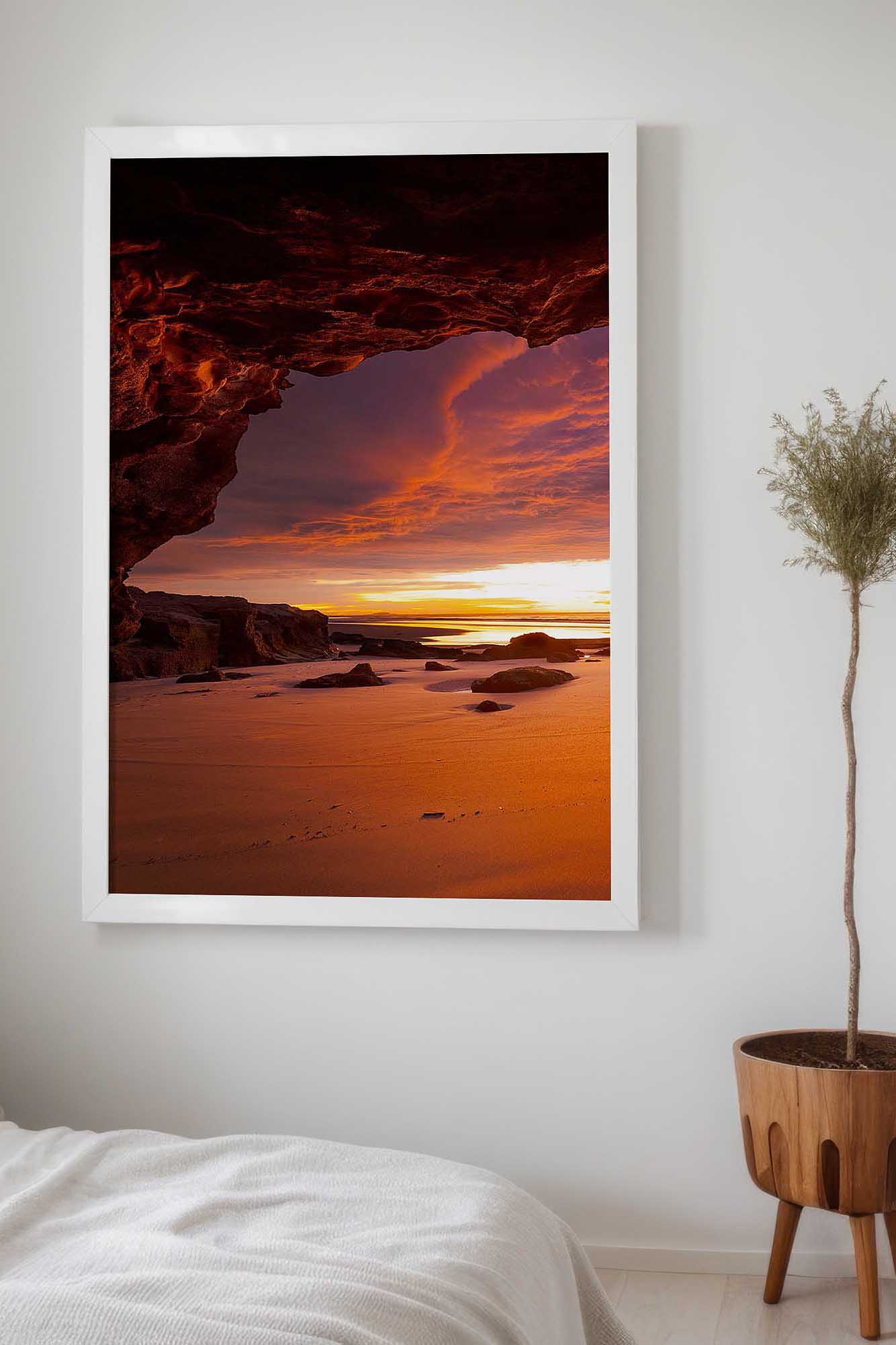 Caves Beach photography print featuring the sea caves and colourful sunrise displayed as framed coastal wall art