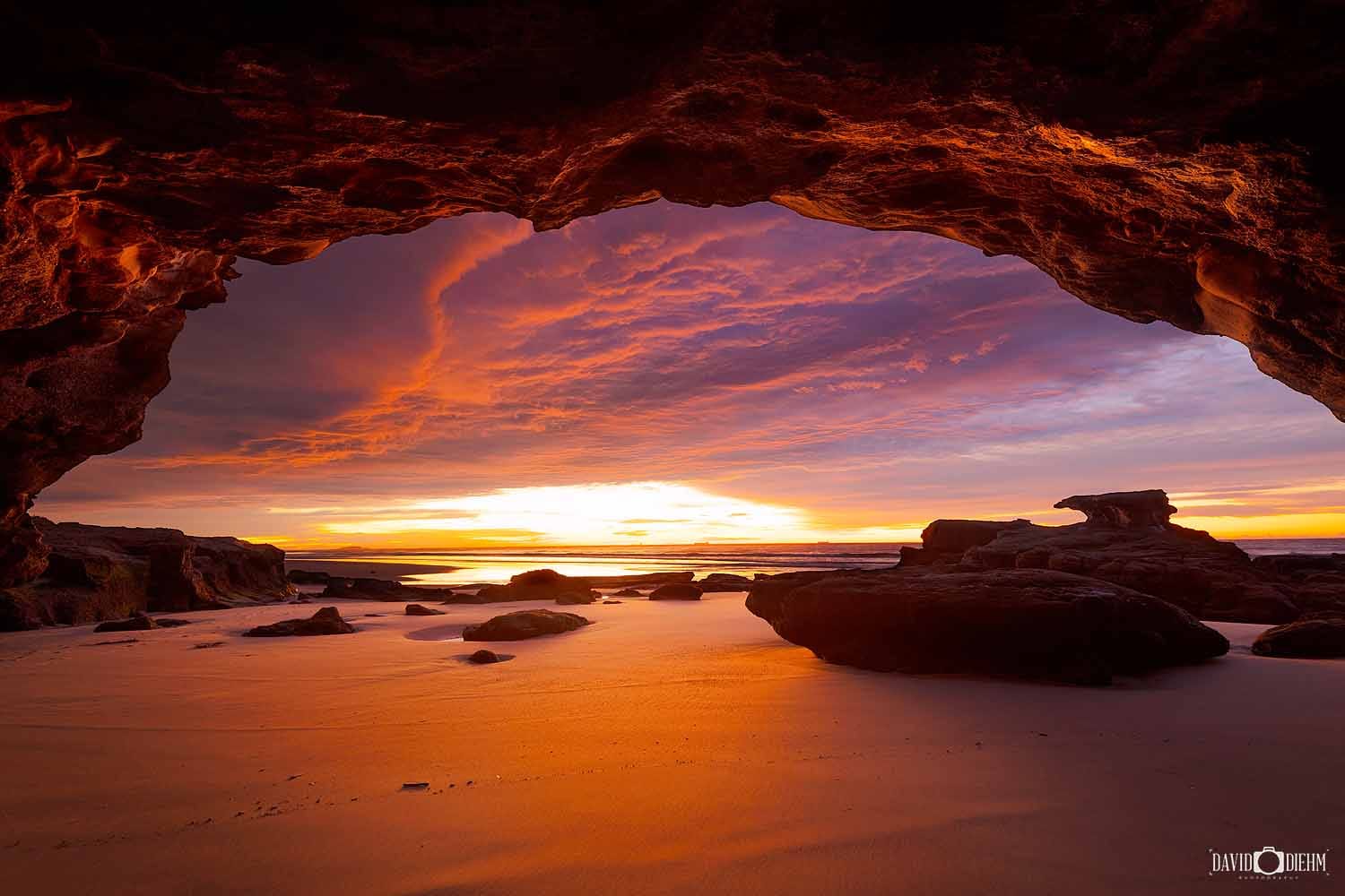 caves-beach-sea-caves-sunrise.jpg Sunrise viewed from inside the sea caves at Caves Beach, Lake Macquarie