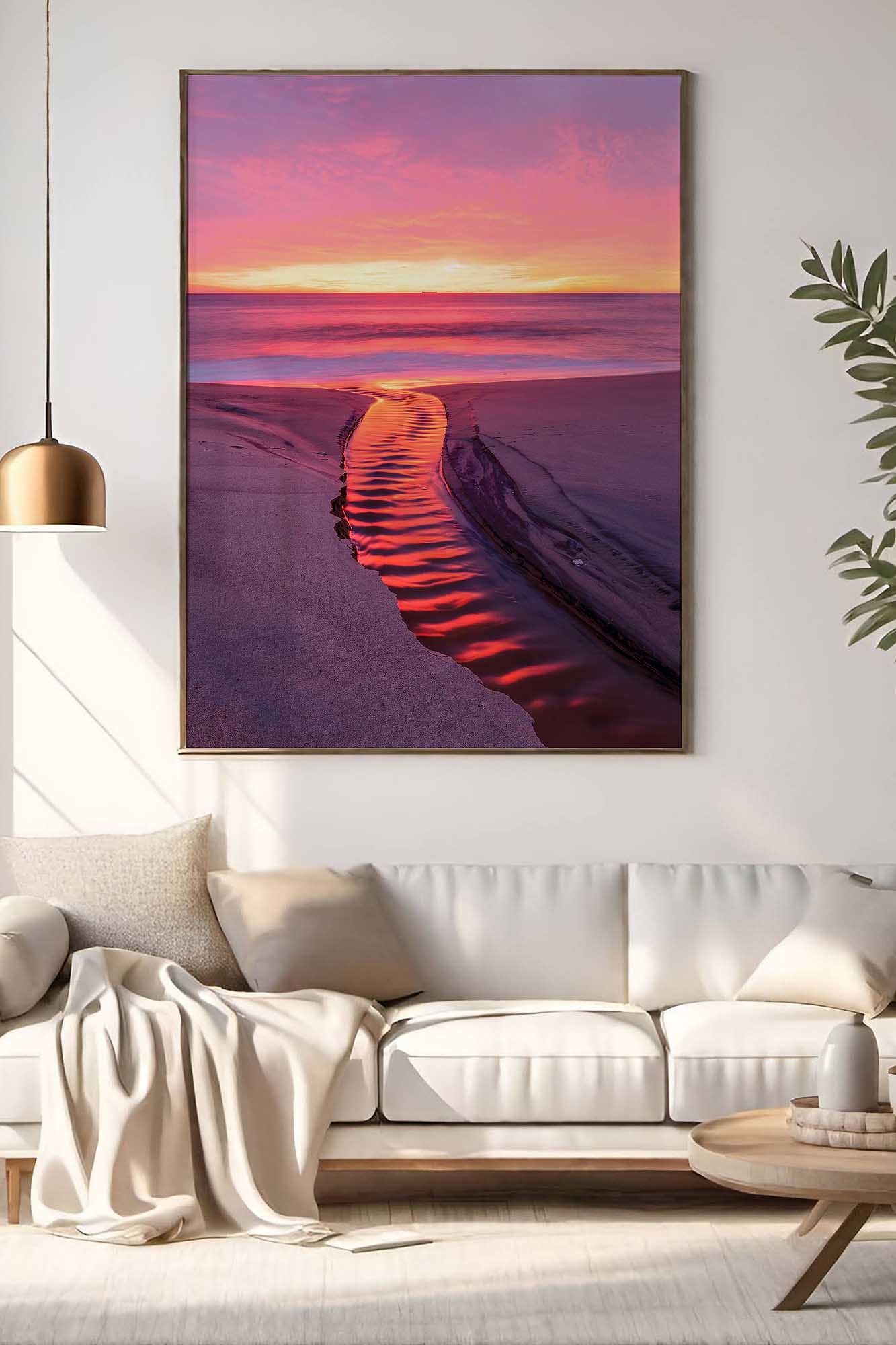 Lake Macquarie coastal photography wall art print featuring a colourful beach sunrise displayed above a sofa