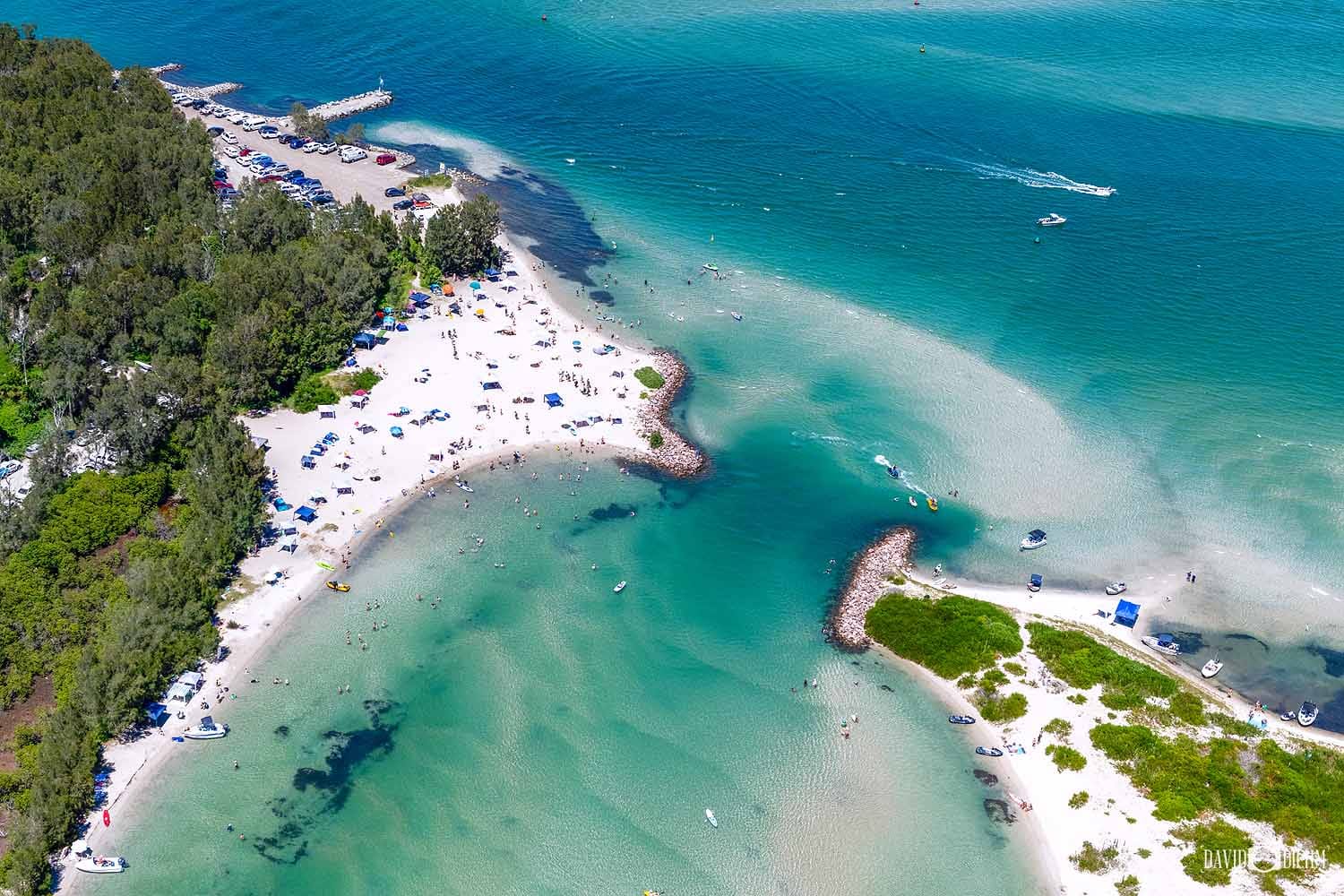 naru-beach-swansea-sand-islands.jpg Aerial view of Naru Beach and nearby Swansea sand islands surrounded by turquoise water.