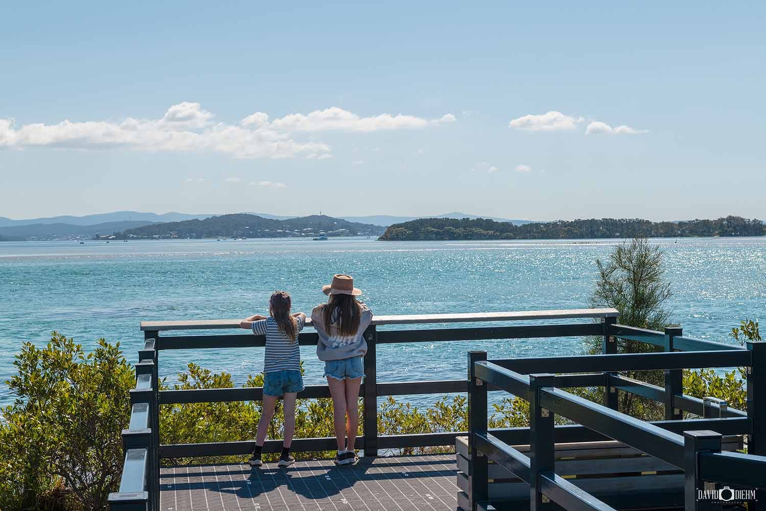 pirrita-island-boardwalk-lake-macquarie-view.jpg Visitors enjoying views across Lake Macquarie from the Pirrita Island Boardwalk.