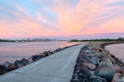 Sunrise over Stockton Breakwall and the Newcastle coastline, NSW.