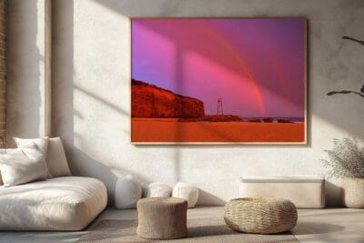Rainbow Over Redhead photographic print featuring Redhead Beach and its iconic shark tower in Lake Macquarie, displayed as framed coastal wall art.