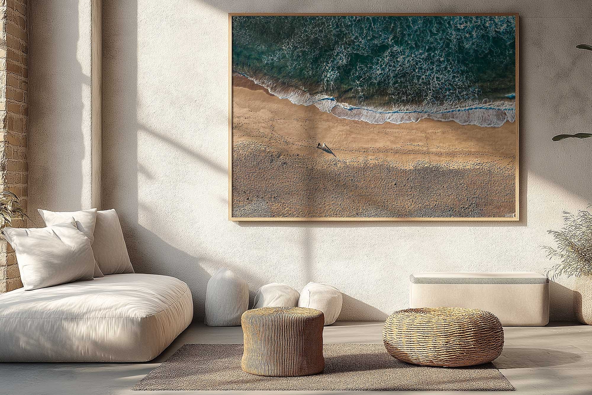 Merewether Beach Newcastle aerial photograph displayed as large framed coastal wall art in a modern living room.